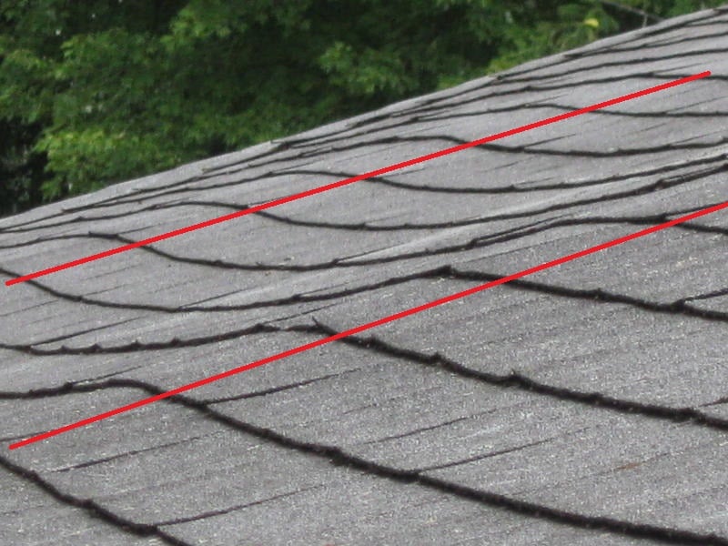 Roof damage: Buckling asphalt shingles