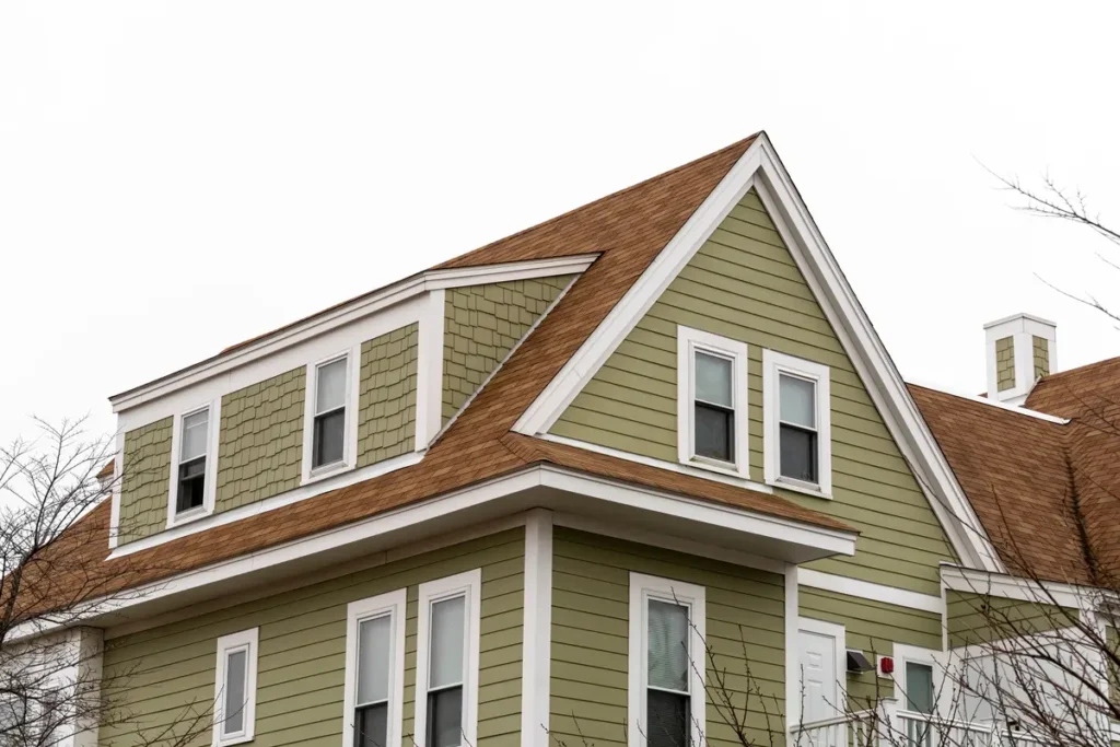 green siding on house