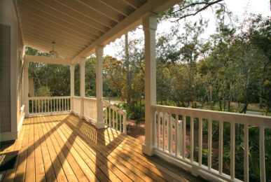 deck railing ideas-house deck with white wooden railing